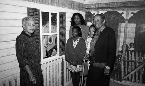 Descendents of Biddy Mason posing together at her commemorative exhibit, Los Angeles, 1989