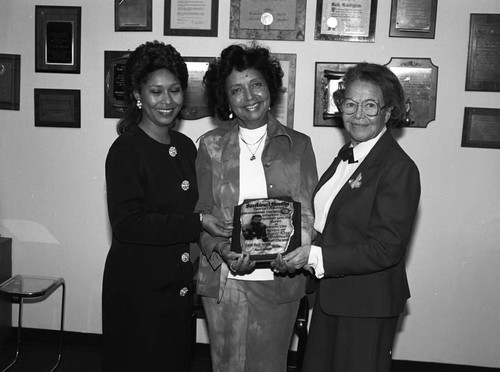 Millie Bruce Robinson receiving an award from Ruth Washington, Los Angeles, 1989