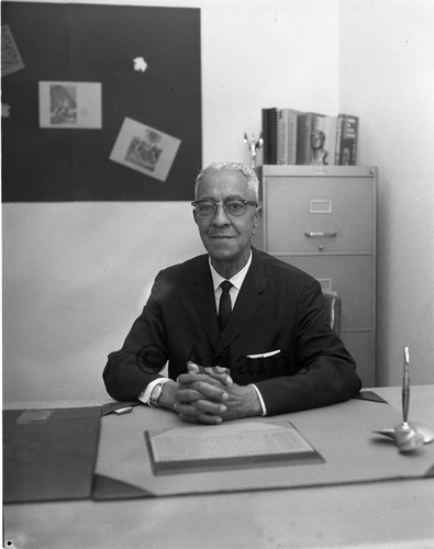 Portrait of man at desk, Los Angeles, ca. 1965