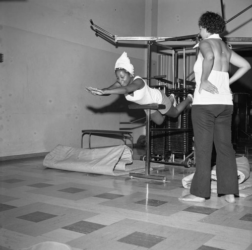 Women exercising at the Compton College gym, Compton, 1972