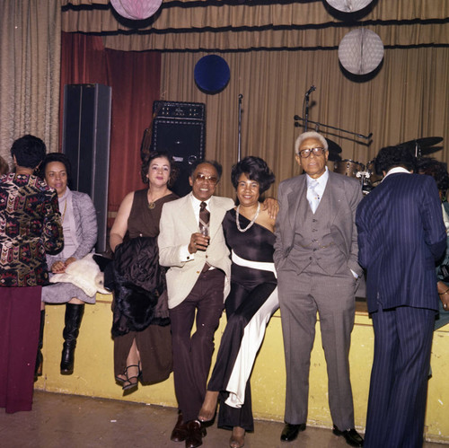 Super Bowl party guests posing together, Los Angeles, 1977