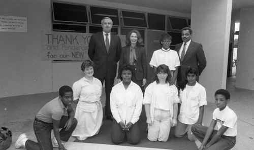 Students and educators posing together on a school patio, Los Angeles, 1985