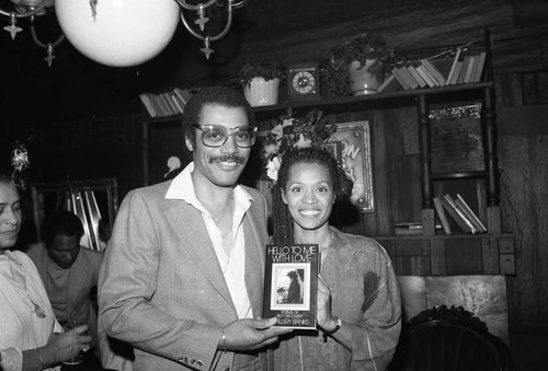 C. Tillery Banks posing with an unidentified man at The Candy Store, Los Angeles, 1980