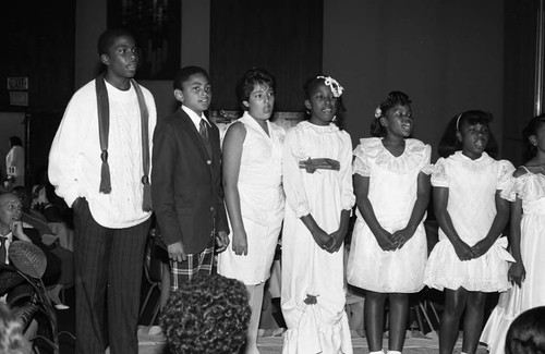 Church Women United children's fashion participants singing, Los Angeles, 1986