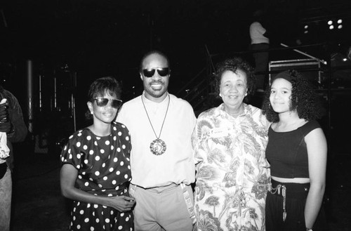 Dorothy Height posing with Melba Moore and Stevie Wonder at the Black Family Reunion, Los Angeles, 1989