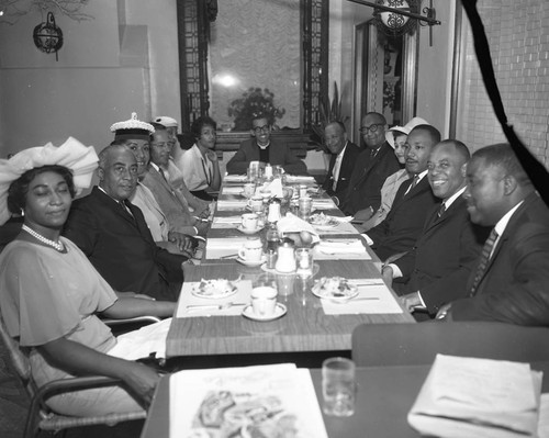 Dr. Martin Luther King, Jr. sitting with Western Christian Leadership Conference members, Los Angeles, 1962