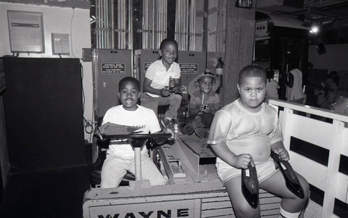 Young boys posing on a forklift, Los Angeles, 1987