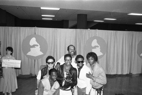 Herbie Hancock posing with band members at the 26th Annual Grammy Awards, Los Angeles, 1984