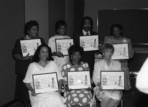 Award recipients posing together during the Urban League Head Start State Preschool Awards Dinner, Los Angeles, 1985