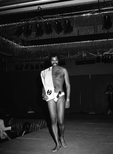 Black Gold Trade Show Pageant participant modeling, Los Angeles, 1983