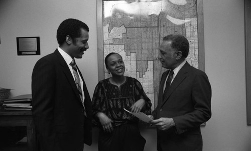 Bernard Parks and Jessie Brewer meeting with a radio producer at LAPD's South Bureau, Los Angeles, 1982