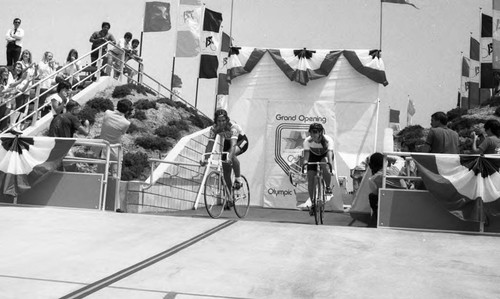 Cyclists racing in a Grand Prix at the Olympic Velodrome's opening, Carson, California, 1982