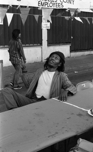 Friends feeding friends, Los Angeles, 1986