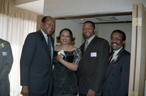 Tom Bradley and Johnnie Cochran posing with others, Los Angeles, 1992