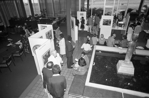 Guests viewing the Harlem Renaissance exhibit at the Greater Savings and Loan Association, Los Angeles, 1982