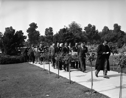 Pallbearers carry casket, Los Angeles, 1949