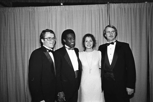 Al Green, Amy Grant, and others posing together at the 25th Annual Grammy Awards, Los Angeles, 1983