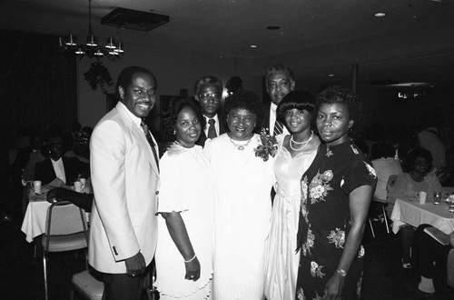 Watts Branch NAACP honoree Marcine B. Shaw posing with family, Los Angeles, 1984