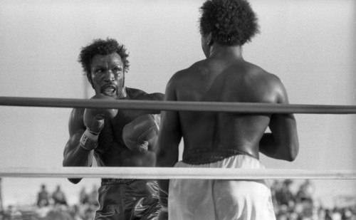 Mike Weaver and Michael Dokes in the boxing ring, Las Vegas, 1983