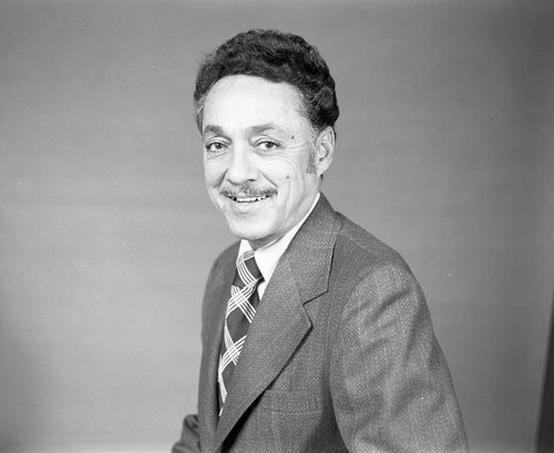 Elbert T. Hudson sitting for a studio portrait, Los Angeles, 1975