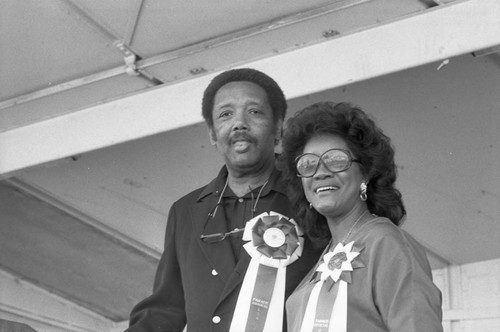 Officials of the 16th annual Easter parade posing together, South Central Los Angeles, 1984