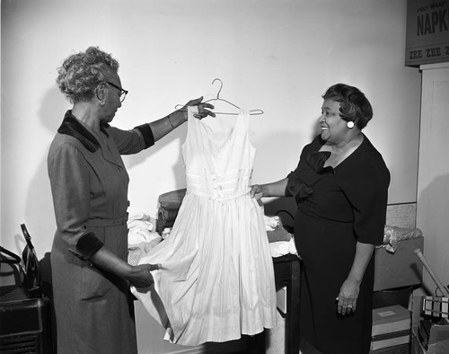 Women Examine A Dress, Los Angeles, 1963