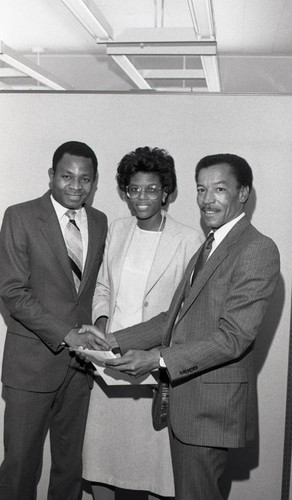 African American Couple Shaking Hands, Los Angeles, 1985