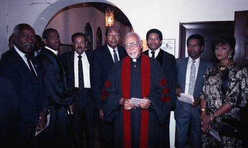 Dr. Thomas Kilgore, Jr., Tom Bradley, Nate Holden and others gathering at a funeral service, Los Angeles, 1989