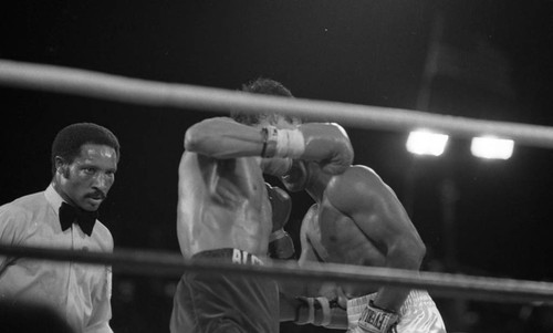 Referee watching Alexis Argüello fight Aaron Pryor in a rematch for the WBA Jr. Welterweight title, Las Vegas, 1983