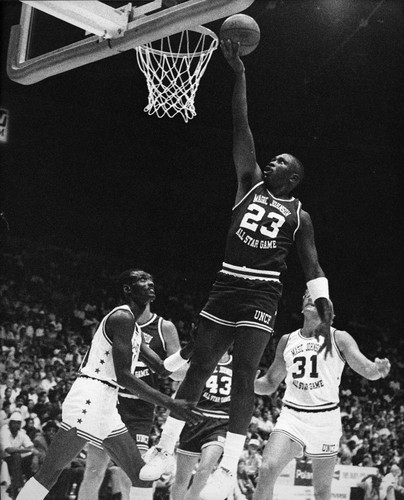 Michael Cooper, Mark Aguirre, and Kurt Rambis at a charity game, Los Angeles, 1989