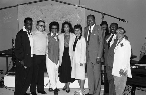 Brock Peters and Didi Daniels Peters posing with others at a Communications Bridge Institute event, Los Angeles, 1987