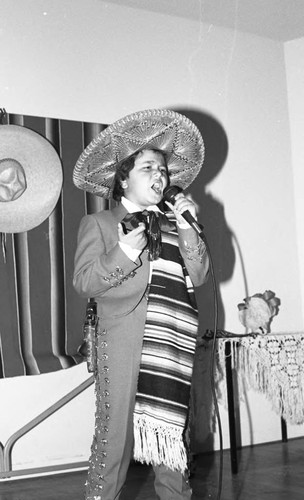 Latino boy singing, Los Angeles, 1986