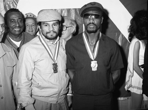Roberto Durán and Marvin Hagler posing together at the Los Angeles Athletic Club, Los Angeles, 1983