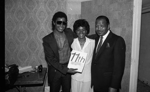 Sugar Ray Robinson posing with participants of his Teen Pageant, Los Angeles, 1984