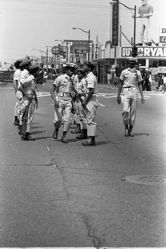 Cinco de Mayo parade drill team performing, Los Angeles, 1973