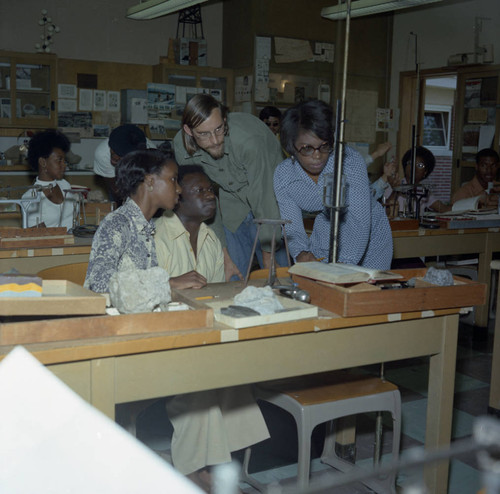 Men and women inside a classroom, Los Angeles