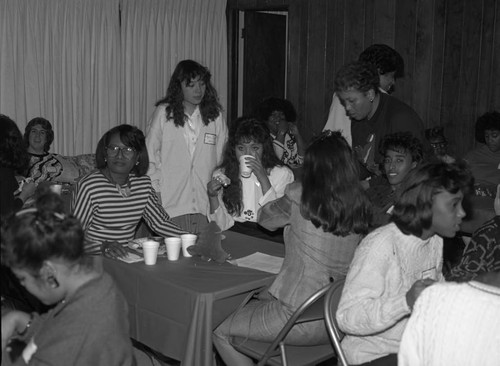 Alpha Kappa Alpha chapter members hosting a holiday party, Los Angeles, 1989