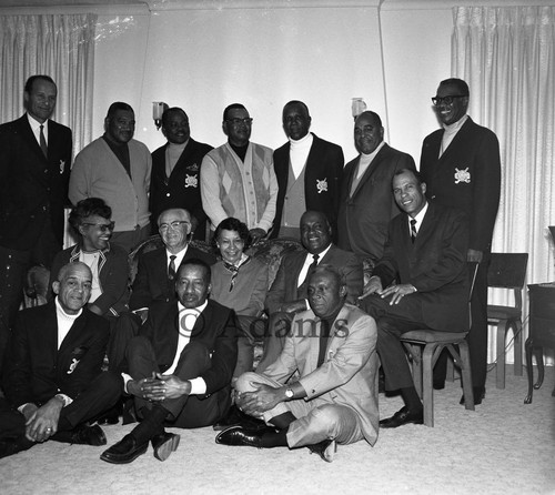 Group of men and women at event, Los Angeles, 1969