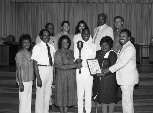 Board of Trustees with the Olympic torch, Los Angeles, 1984