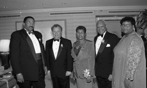 Willie L. Williams posing with others at the Los Angeles Urban League Whitney M. Young Award Dinner, Los Angeles, 1994