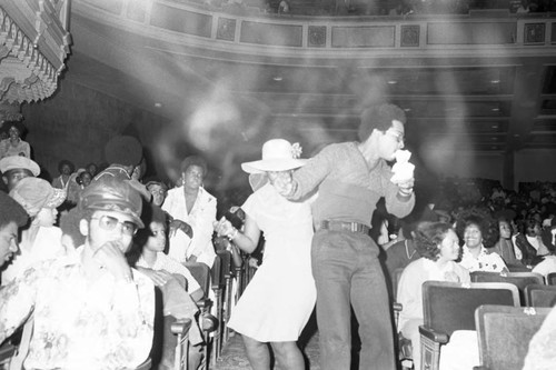 Audience members dancing during KGFJ's Soul Search contest, Los Angeles, 1975