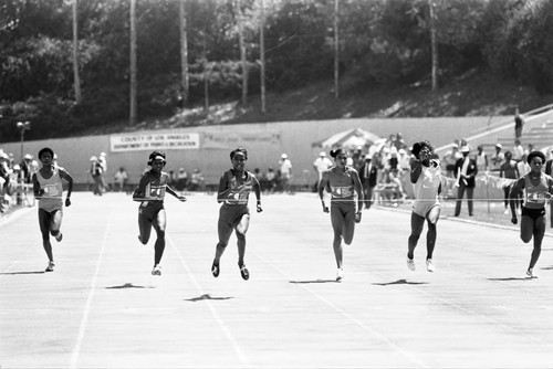 Evelyn Ashford and others approaching the finish line, Los Angeles, 1982