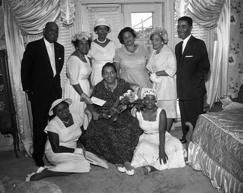 Mrs. Madia Bonner presenting and envelope to Mrs. Clayton Russell, Los Angeles, 1960