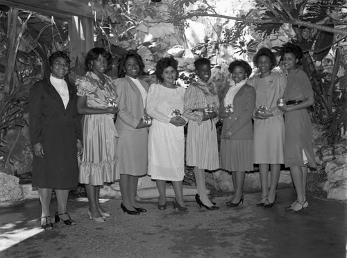 Holy Sisters posing together on a garden patio, Los Angeles, 1983