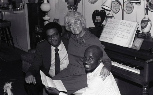 Elderly Woman with Young Black Men, Los Angeles, 1984