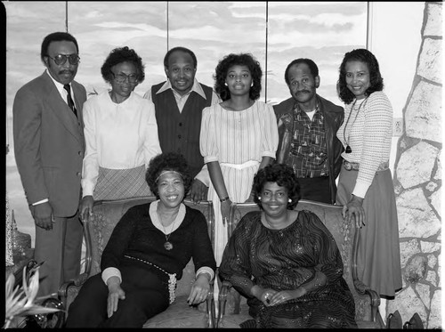 Texas high school alumni posing together, Los Angeles, 1983