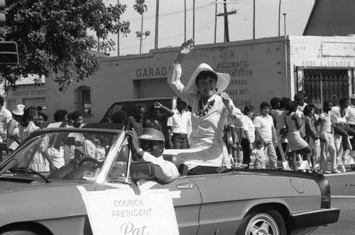 Pat Russell riding in the 16th annual Easter parade, South Central Los Angeles, 1984