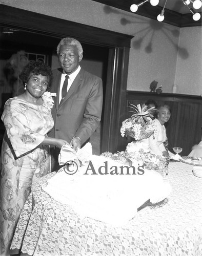 Cutting cake, Los Angeles, 1970