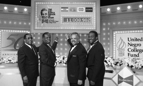 Lou Rawls and others posing together during the "Parade of Stars" telethon, Los Angeles, 1994