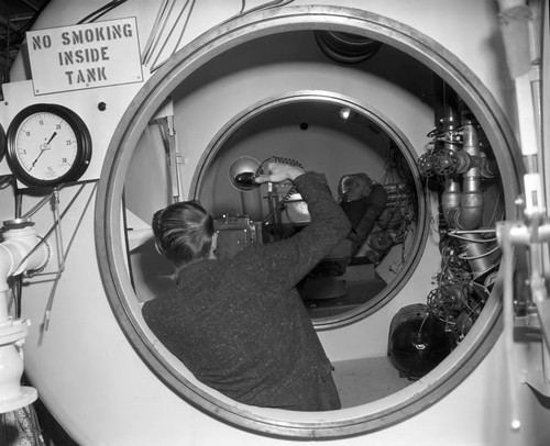 Gordon Hahn inside a tank, Los Angeles, 1962